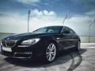 black BMW sedan luxury car