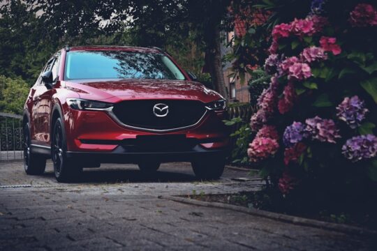 red Mazda SUV car
