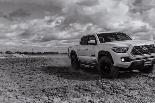 white pickup truck offroad